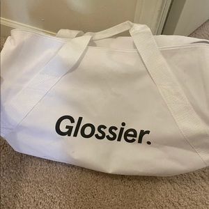 Glossier duffel